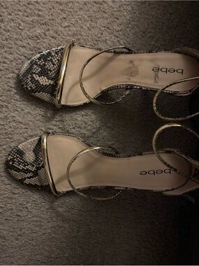 bebe Gold Strappy Sandals with Snake-Print Toe